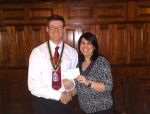 Nick Hunter presents a cheque to Denise Arstall